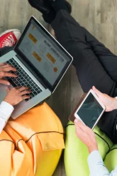 two-business-men-working-tablet-laptop-2-scaled